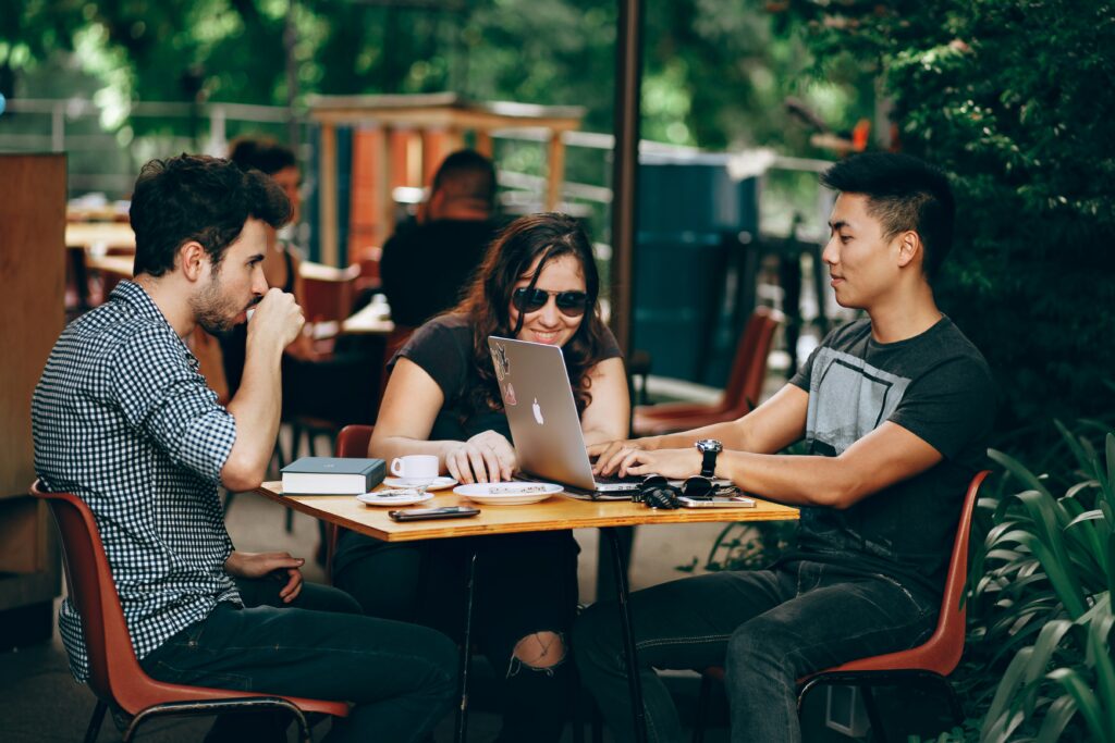 three people chatting